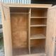 Large antique wardrobe in raw wood