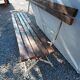 Folding garden bench in wrought iron and wood