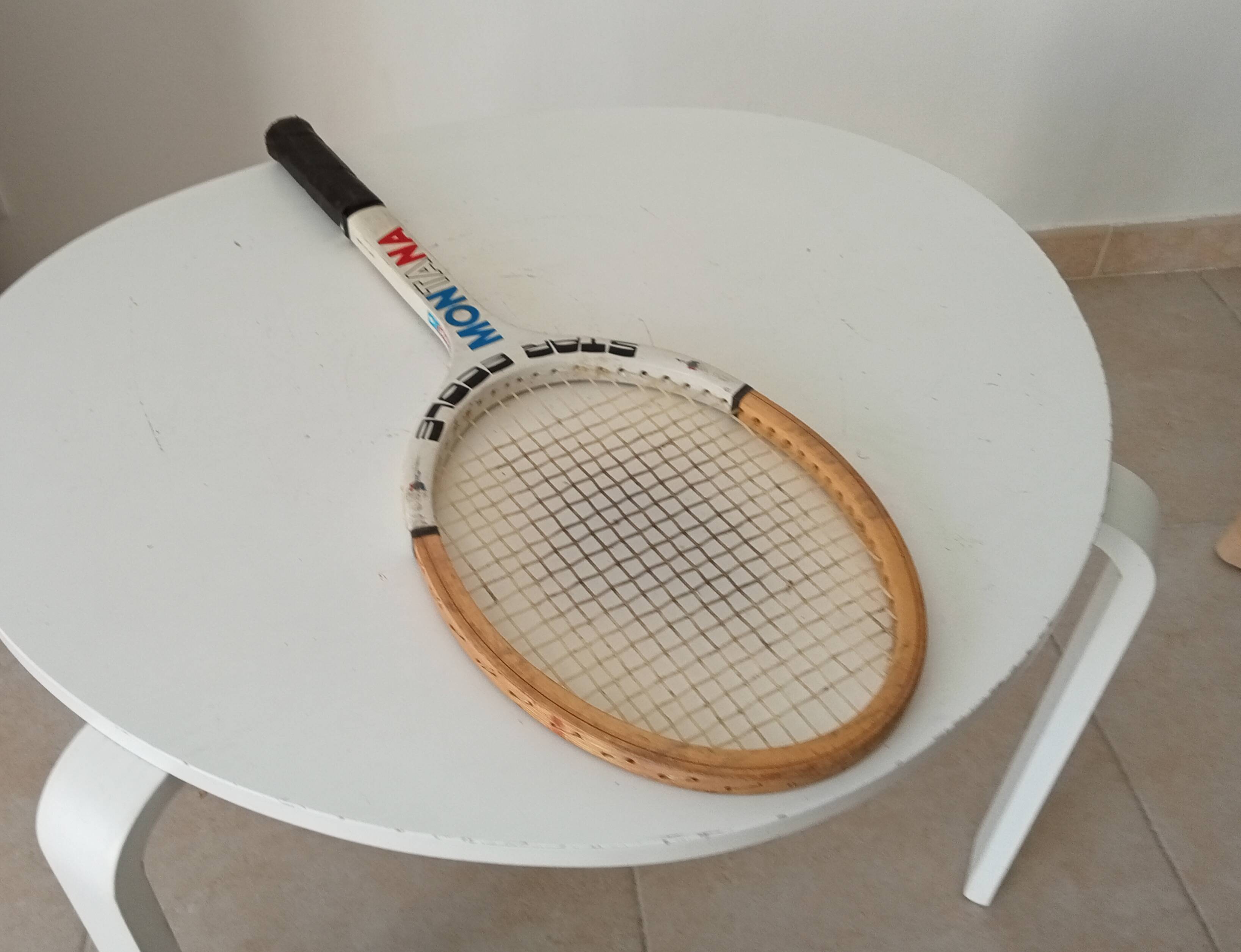 Vintage wooden tennis racket Montana