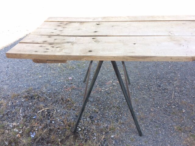 Oak table on metal trestles