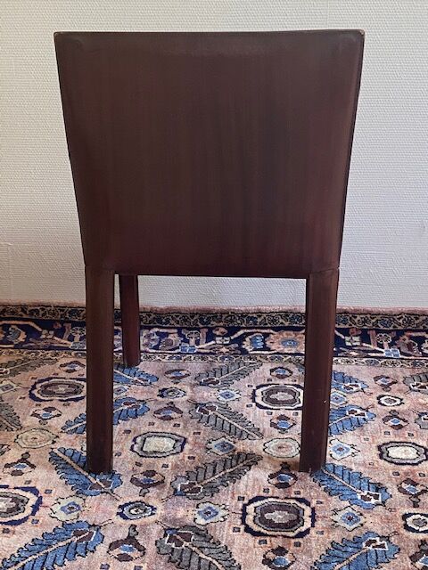 Suite de Quatre Chaises Matéo Grassi gainées de cuir bordeaux