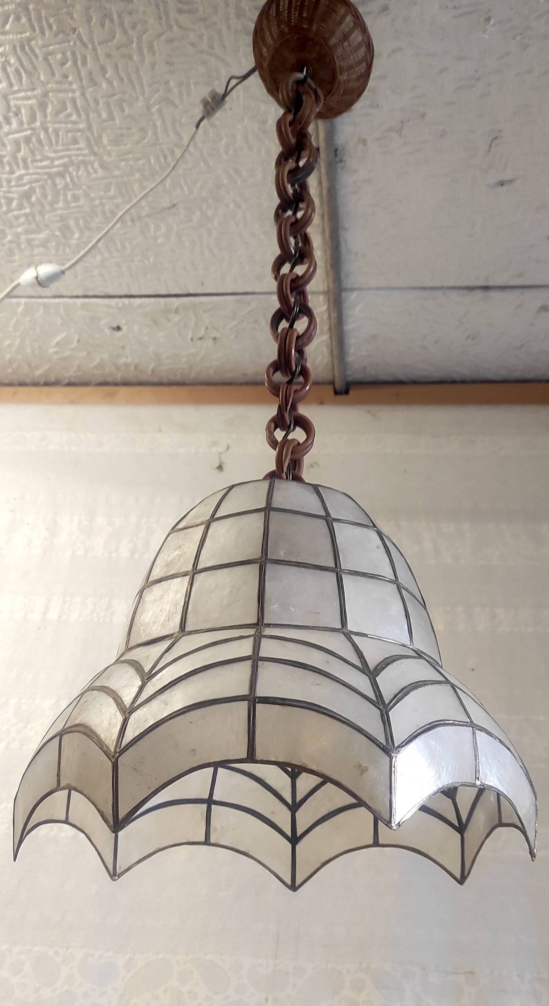 Mother-of-pearl and brass suspension, mid-20th century.