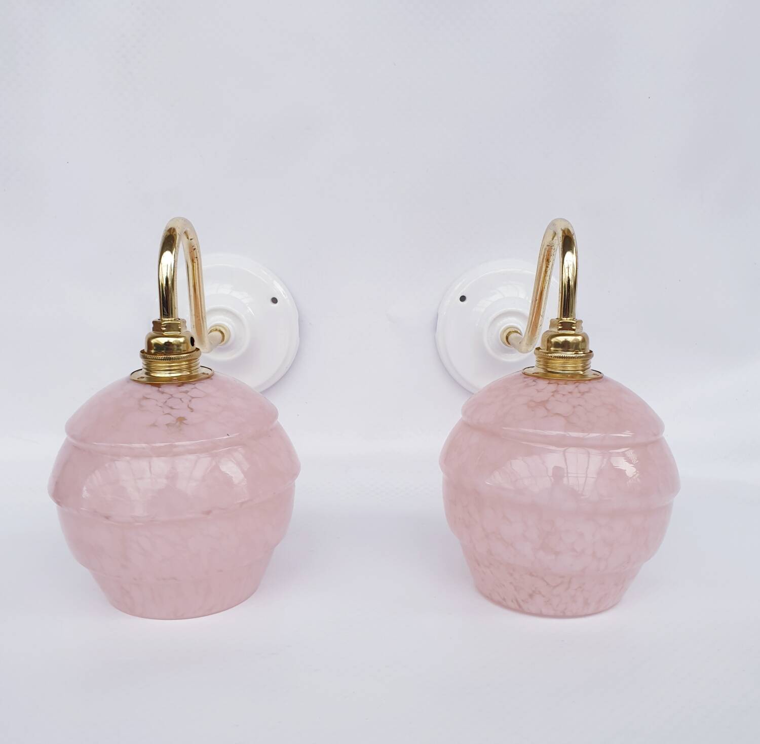 pair of vintage speckled pink and brass wall lights