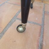 Lacquered coffee table with vintage wheels 70s
