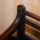 Antique entrance bench by Jas Shoolbred with brass fittings and walnut frame circa 1890.