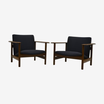 Pair of chairs of Gilbert Steiner mahogany and blue fabrics