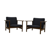 Pair of chairs of Gilbert Steiner mahogany and blue fabrics