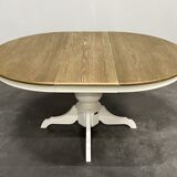 Round extendable oak dining table
