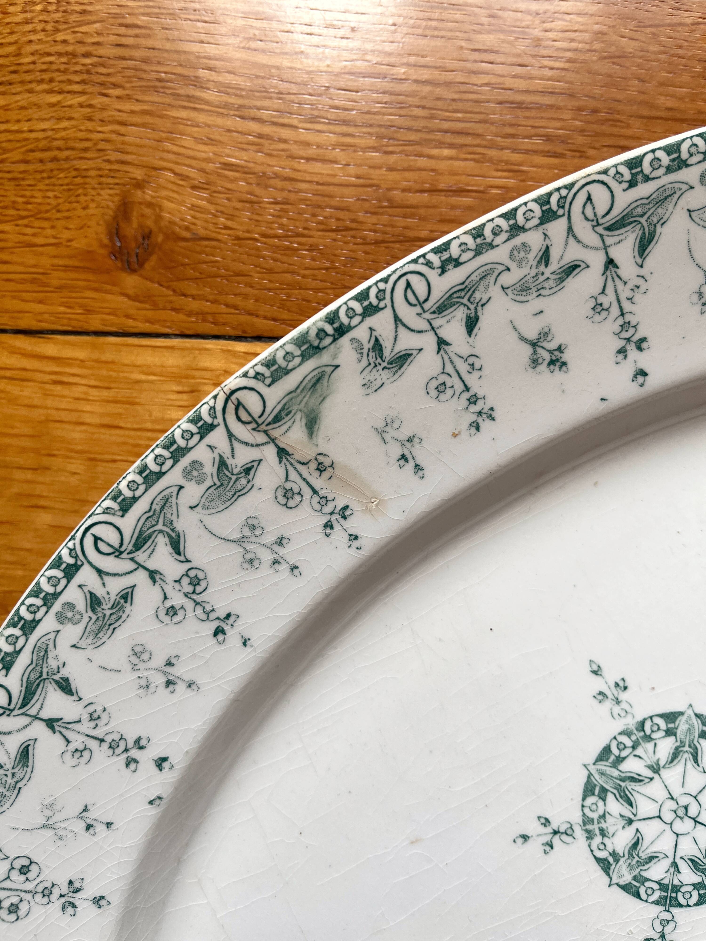 Opaque "Sagittaires" ironstone oval dish from Gien