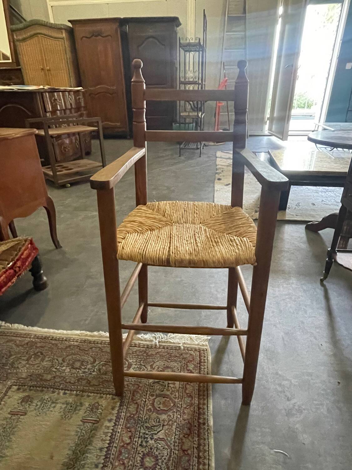 Wooden and straw high chair for children