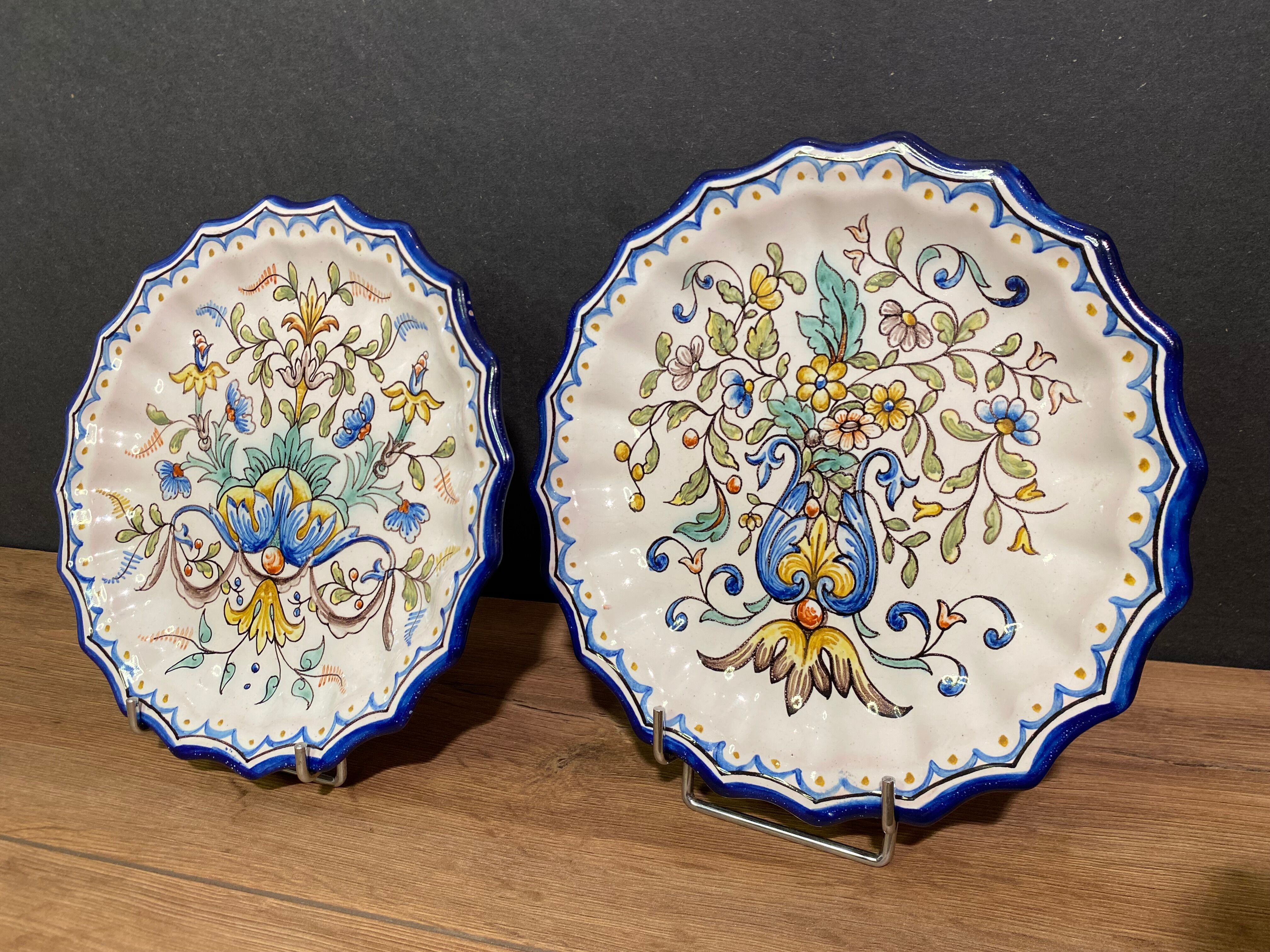 Pair of plates with floral decoration in Nevers earthenware signed Montagnon