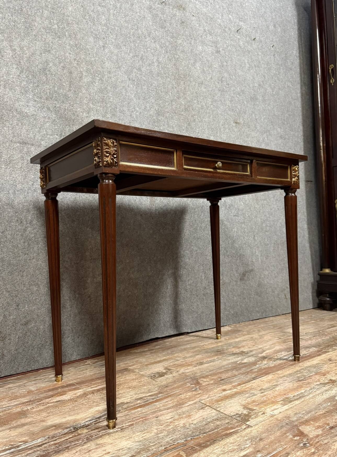Parisian Louis XVI style desk in mahogany and gilded bronze