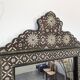 Orientalist mirror with bone inlays and hard stone cabochons.