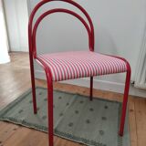 Red lacquered tubular chair