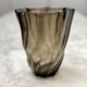 Small translucent dark brown twisted glass vase