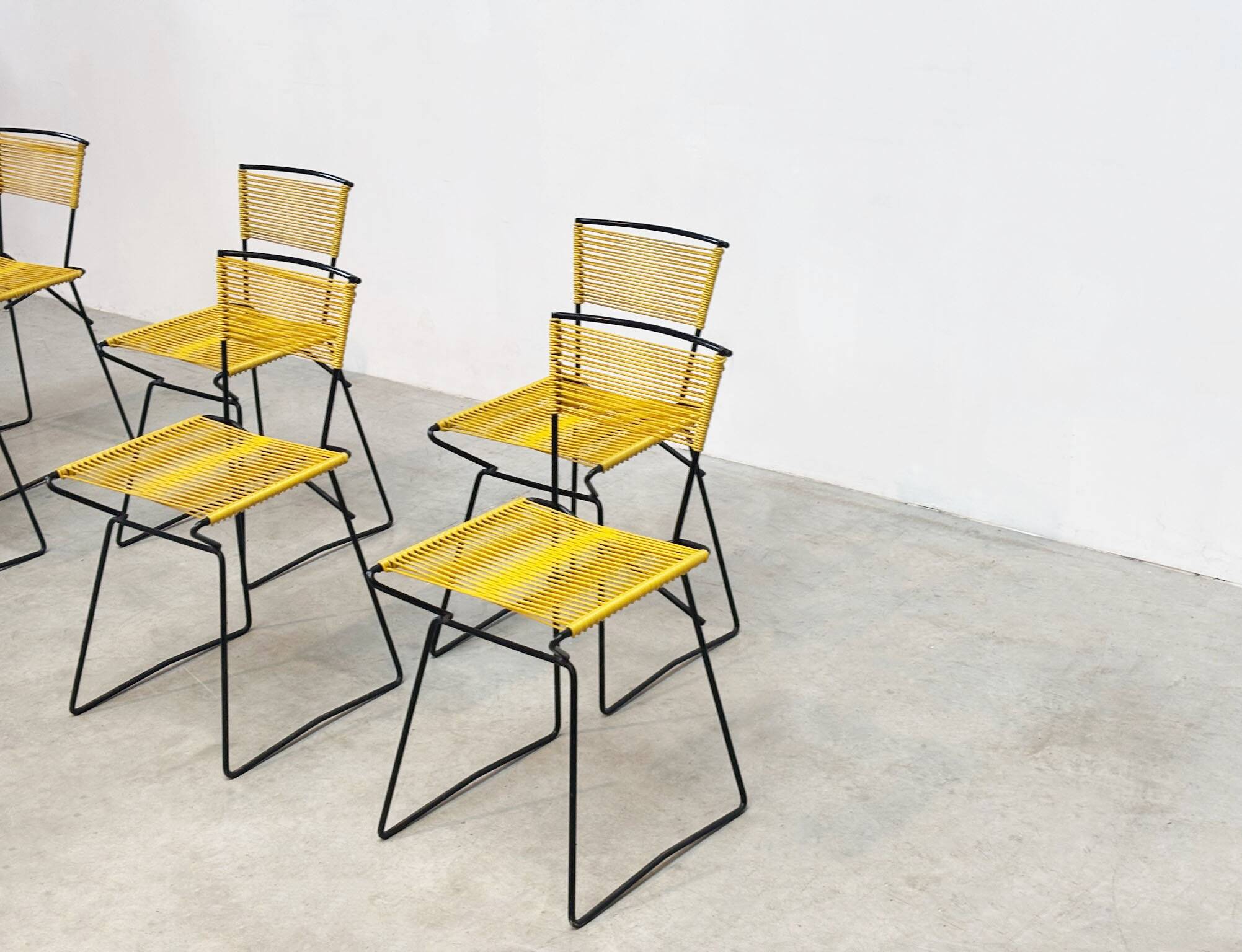 Set of six 'Spaghetti' dining chairs