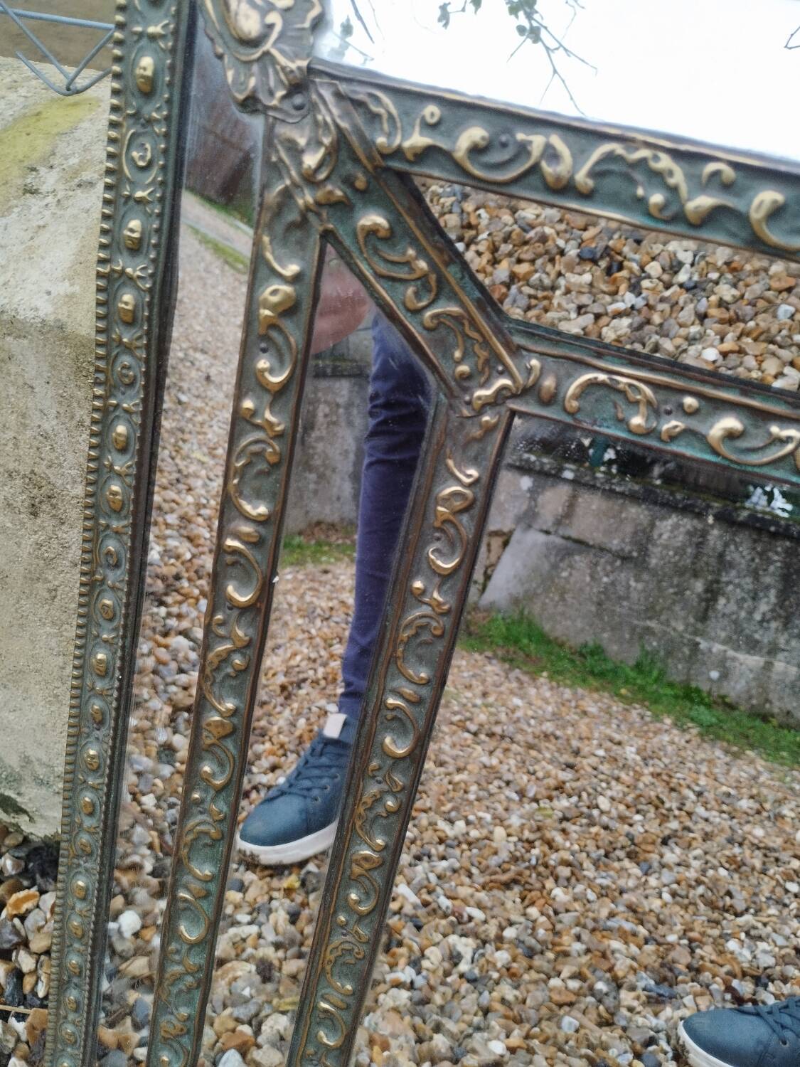 Antique mirror with copper moulding.