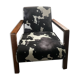 Armchair in walnut and animal print velvet