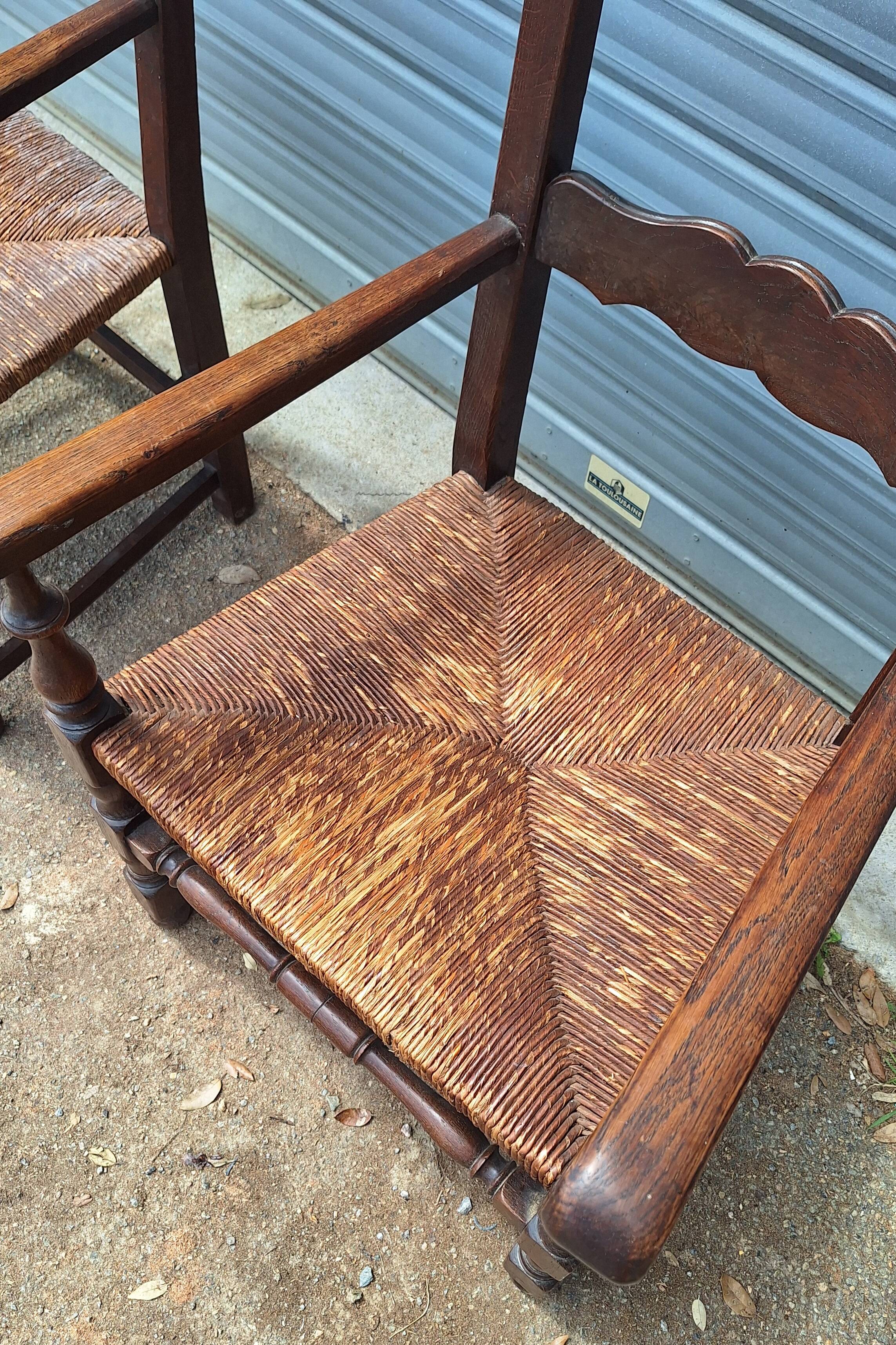 Pair of wooden and straw farmhouse armchairs