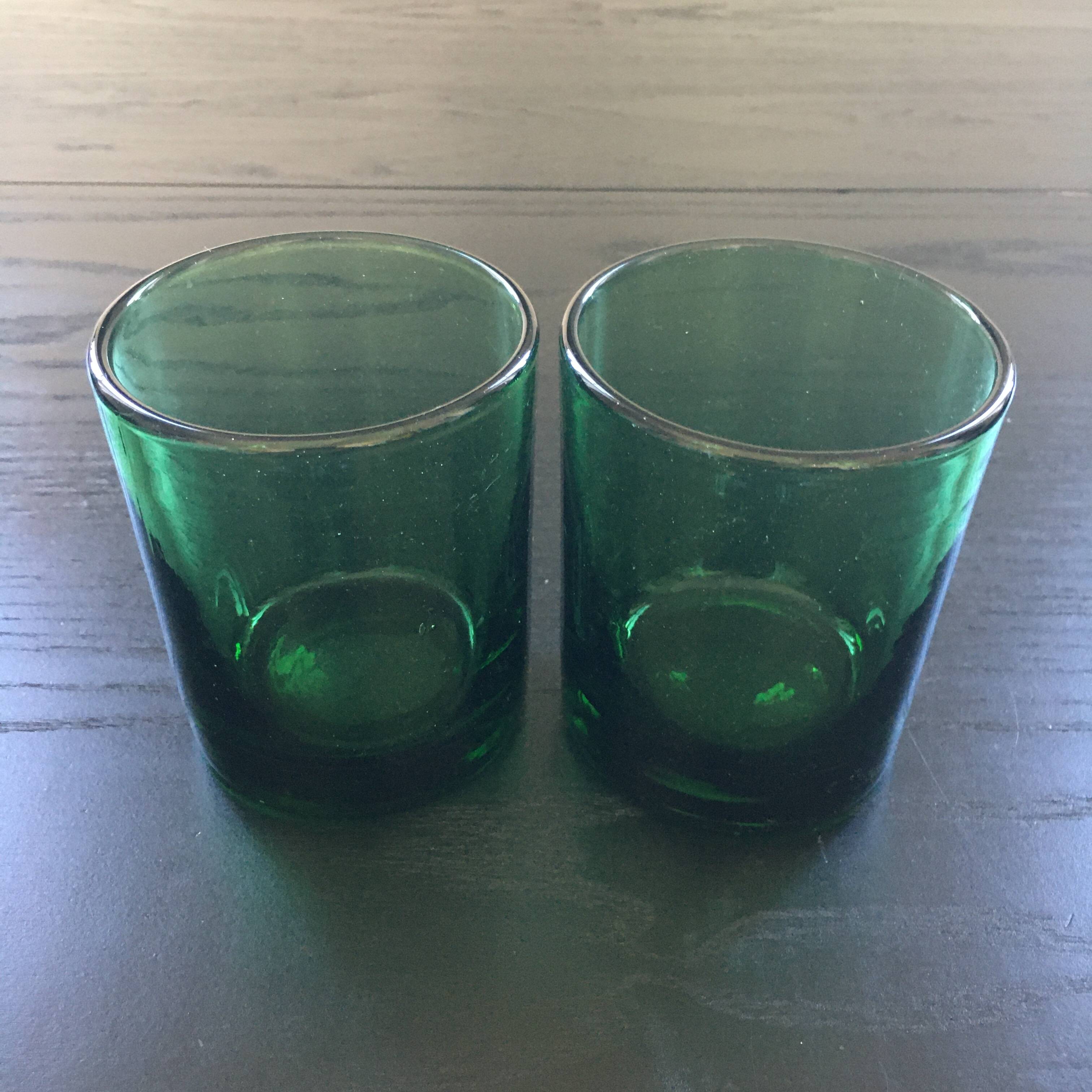Pair of thick green glasses
