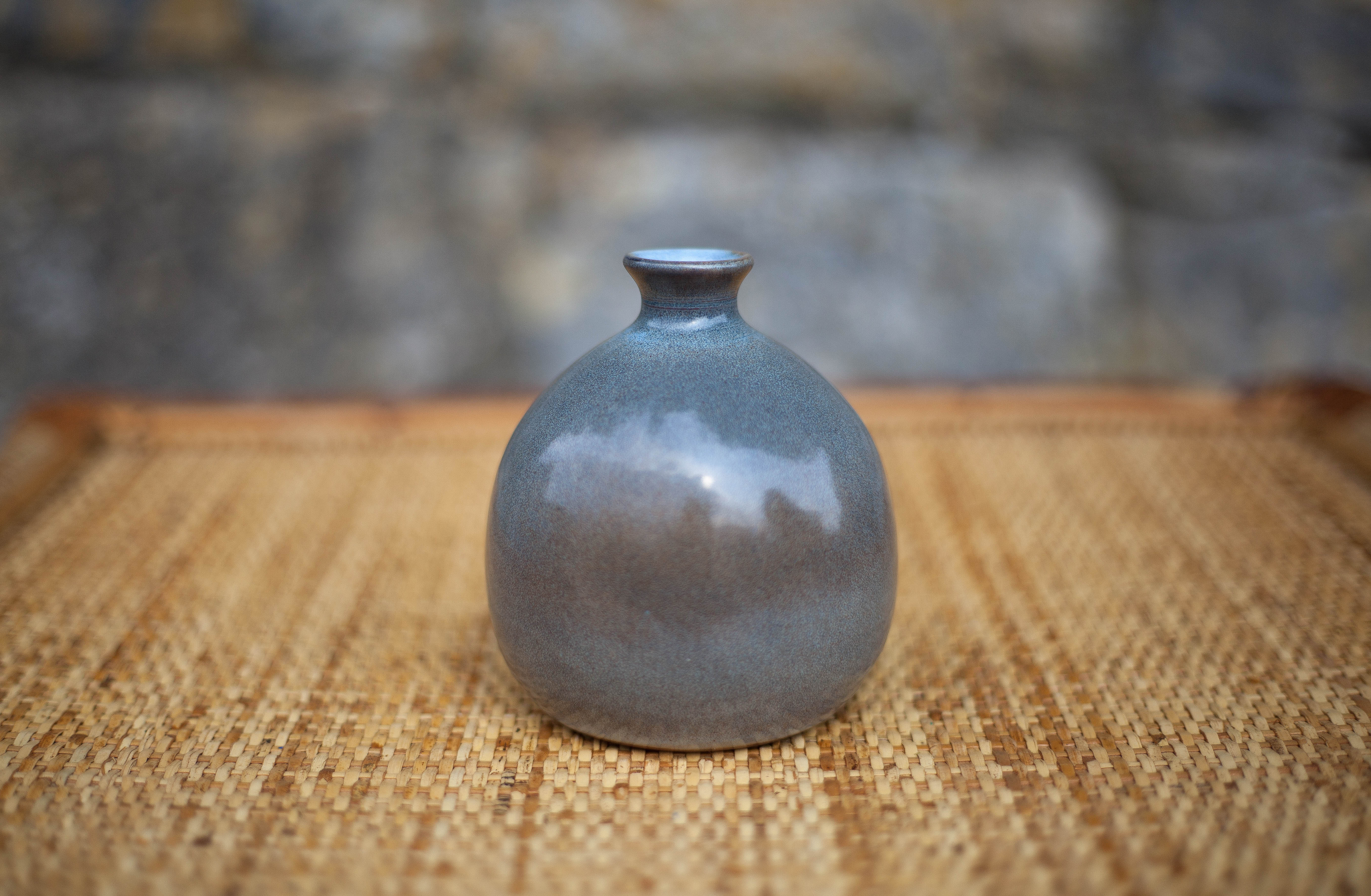 Glazed terracotta ball vase