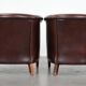 Set of two cow leather club armchairs in a luxurious red/brown colour