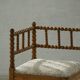Antique French corner chair handcrafted with lamb's wool, early 20th century.
