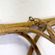Pair of Louis Sognot rattan sconces
