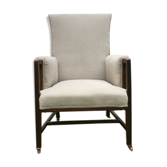 Fauteuil rembourré en chêne vintage sur des roulettes en beige