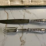 Leg cutlery set. Silver handles.