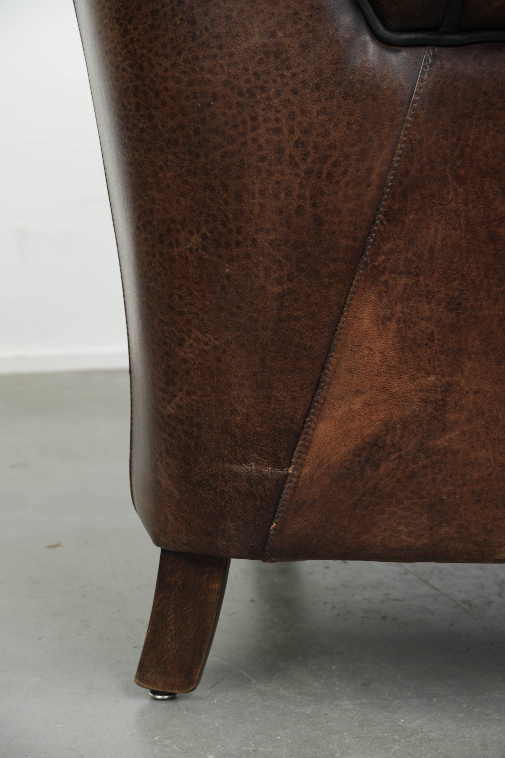 Vintage sheepskin armchair with a unique design and timeless appearance