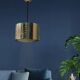 Hammered copper metal pendant light with a golden cylindrical shade.