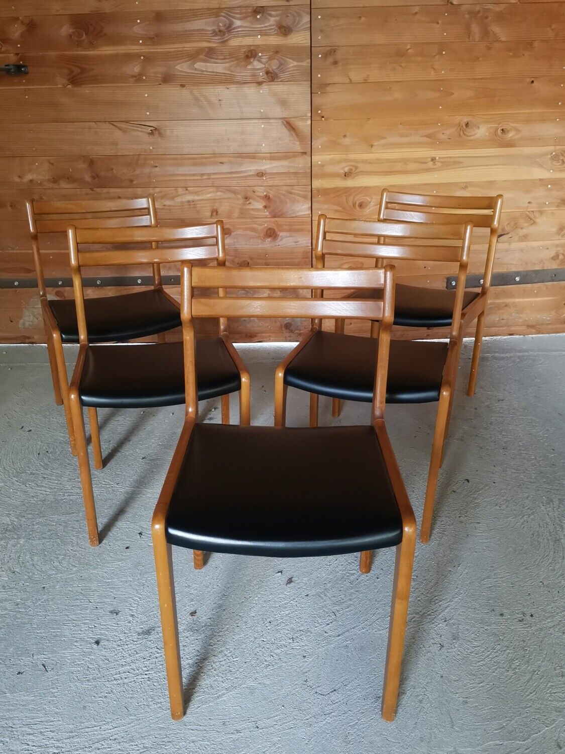 5 vintage black skai chairs