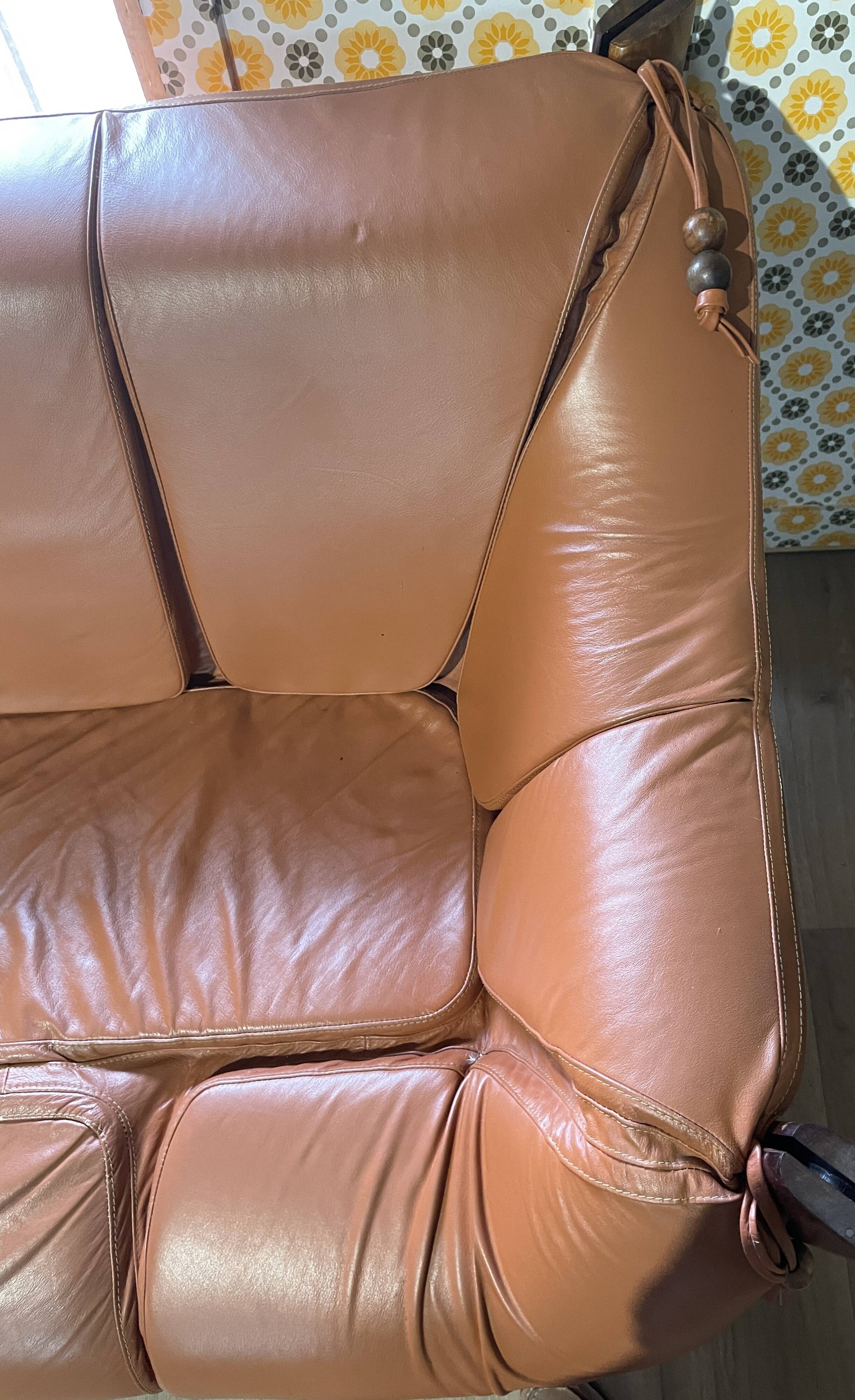 Percival lafer mp-211 sofa set with two armchairs and an ottoman in leather.