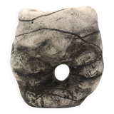 Ceramic vase sculpture decorated with faces and featuring a hole, 1980s.