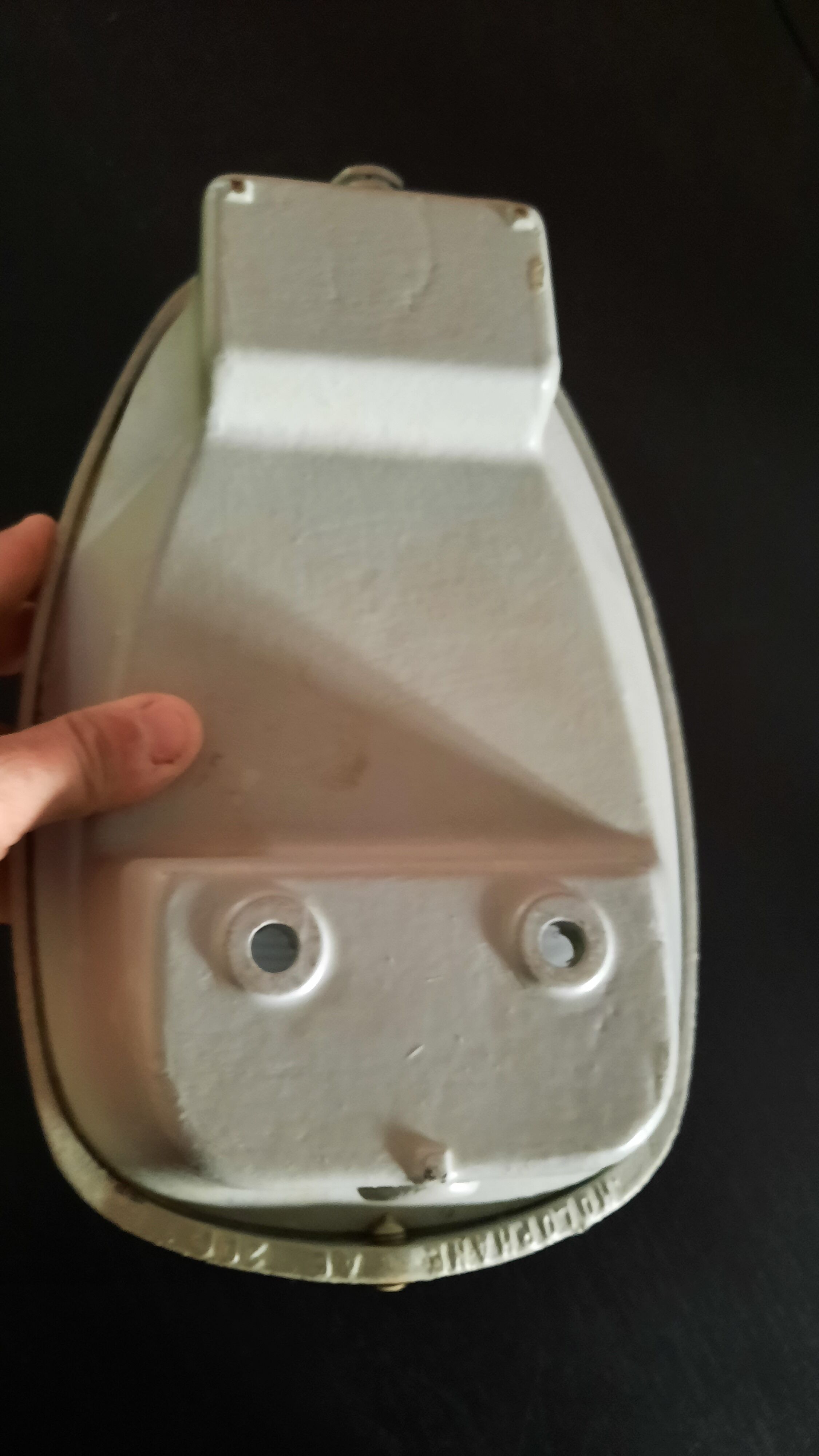 Holophanous cast iron wall lamp