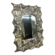 Free-form mirror decorated with cherubs.