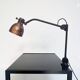 Industrial in height to be adjusted vintage clamp lamp from the 1970s