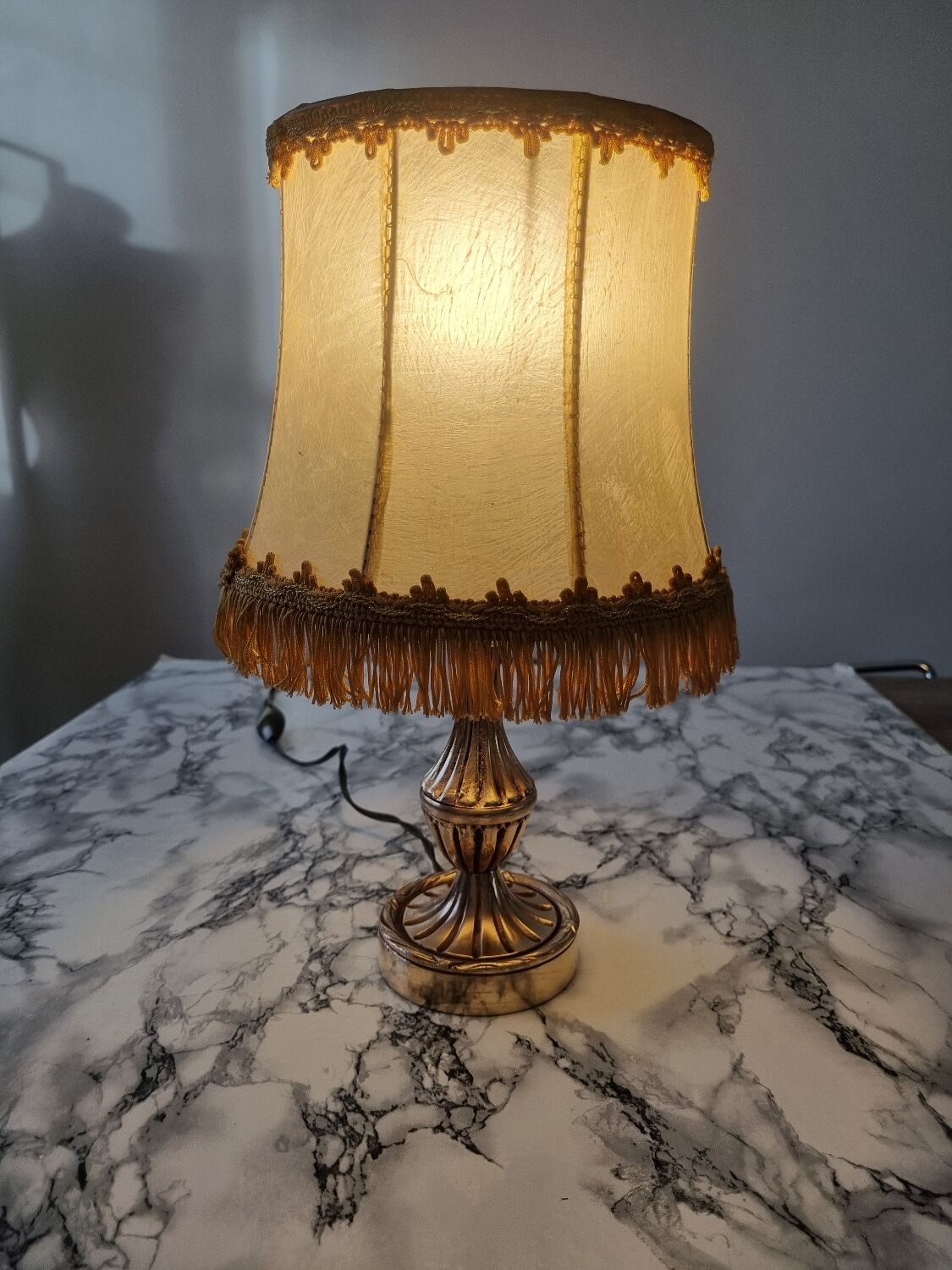 Brass lamp with vintage mother-of-pearl lampshade