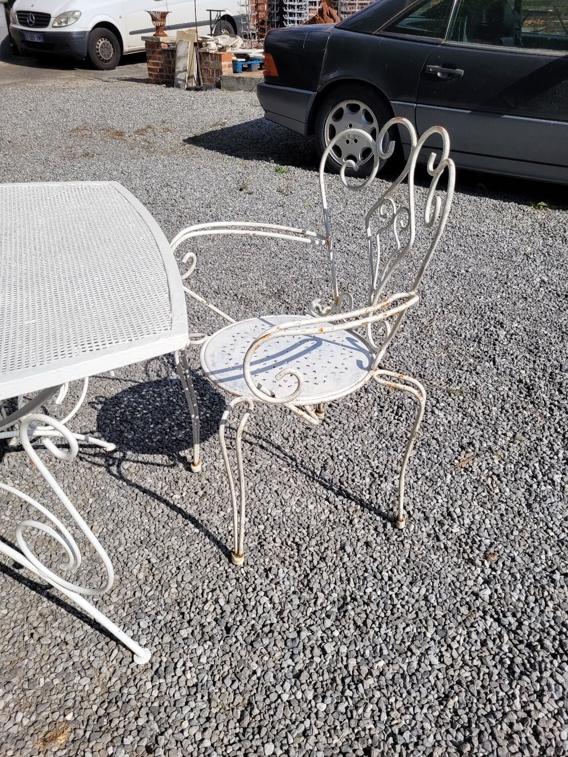 Old wrought iron garden furniture, table + 2 armchairs + 2 chairs