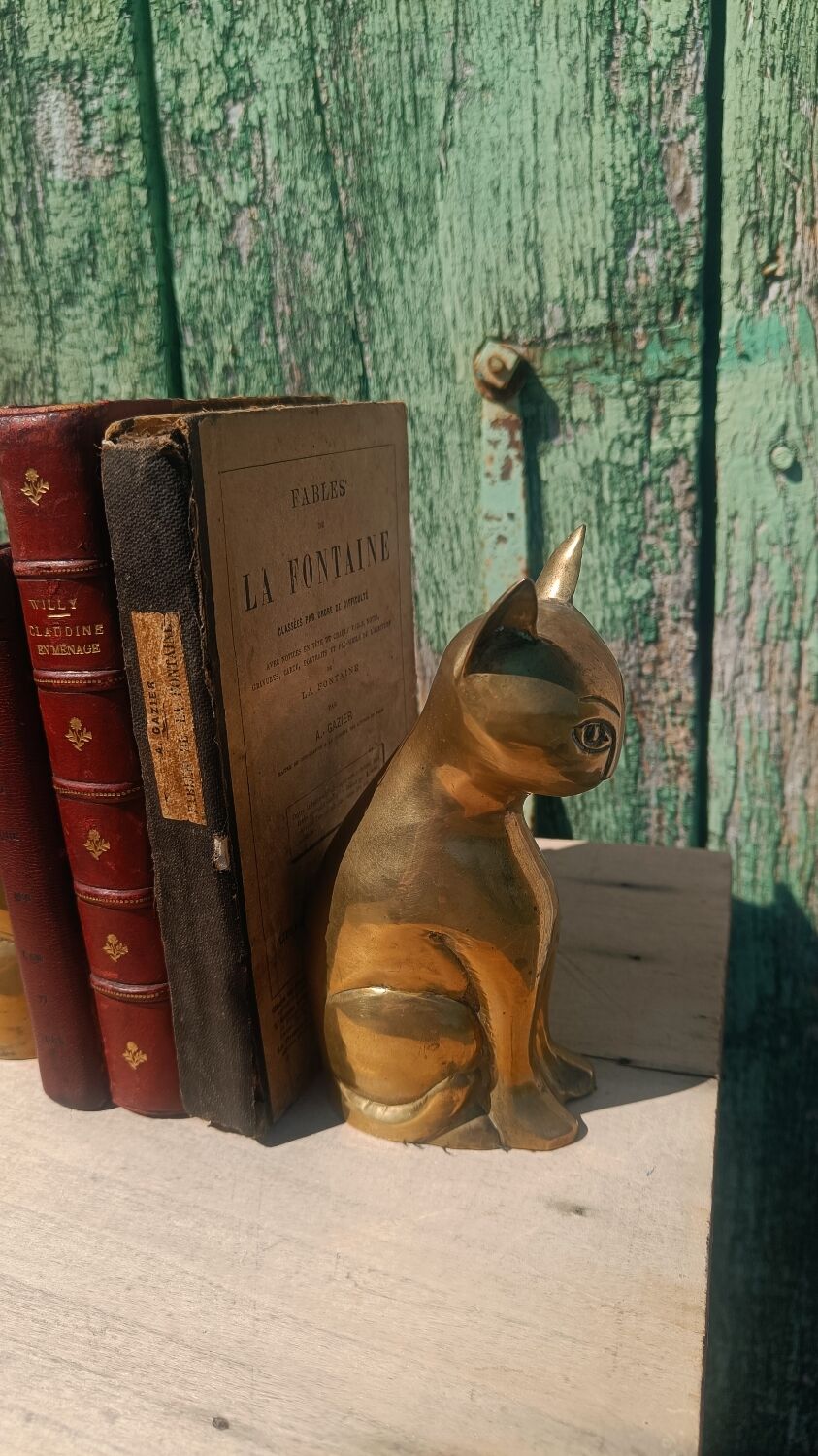 Gold-plated brass bookend cat