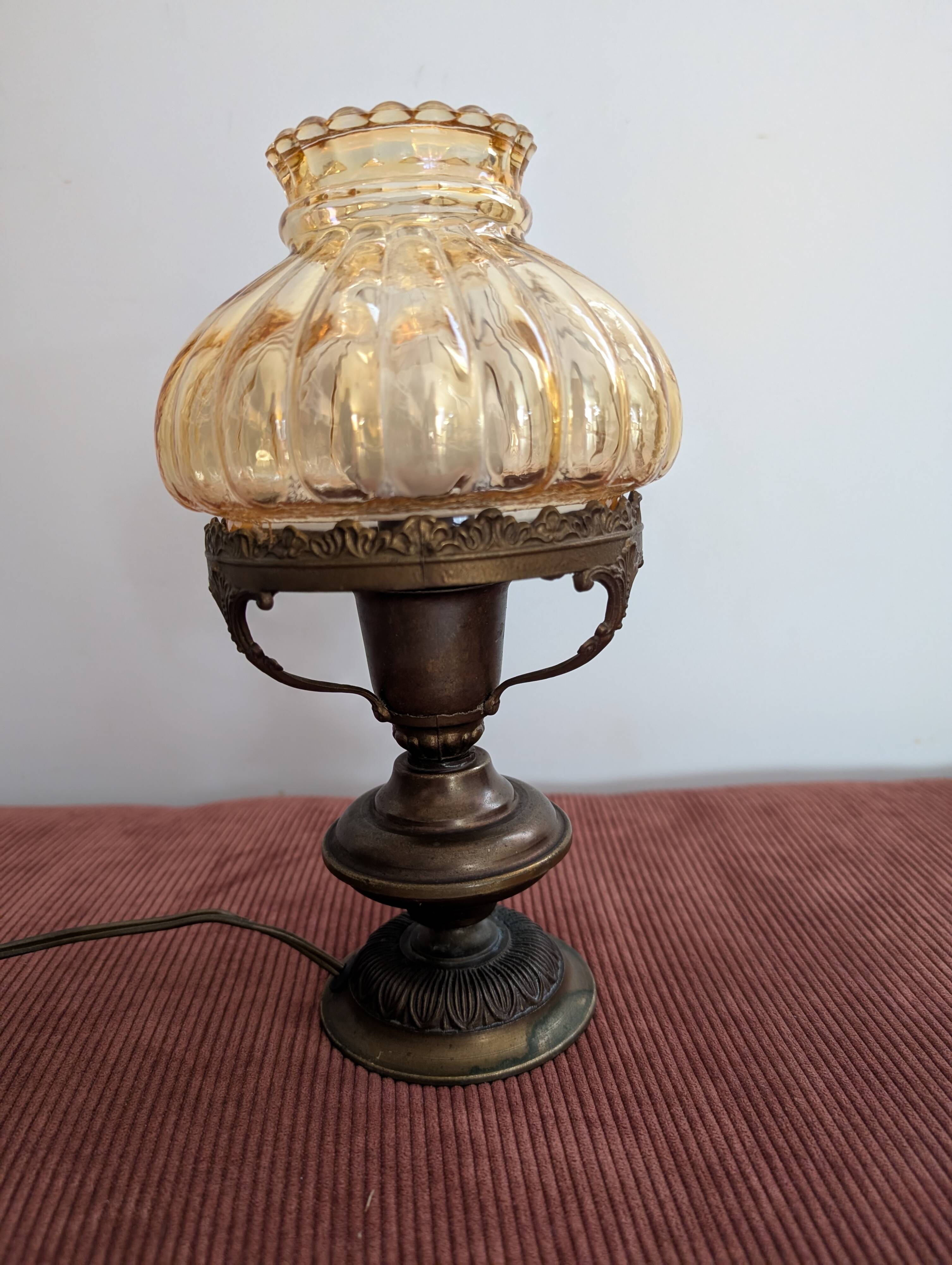 Vintage lamp in brass and amber glass