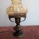 Vintage lamp in brass and amber glass