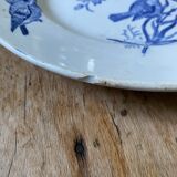 Plate decorated with blue birds and butterflies