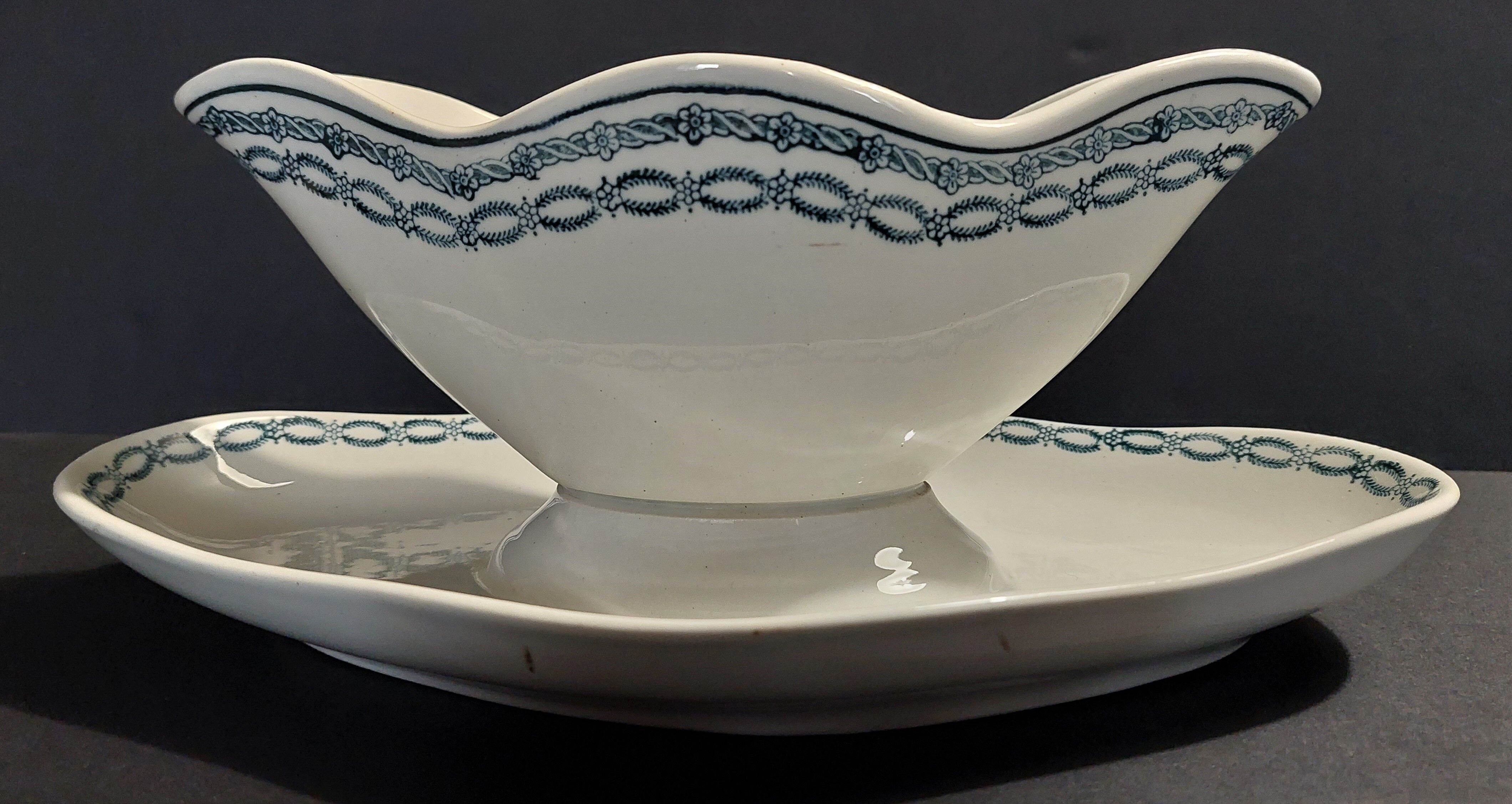Faience sauce boat from Saint Amand