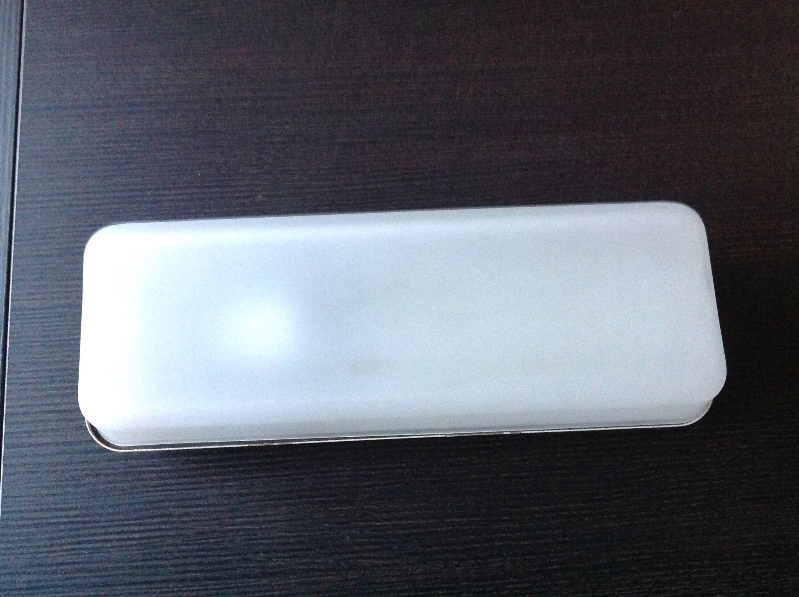 Rectangular porthole wall light in industrial/70s style frosted glass