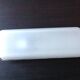 Rectangular porthole wall light in industrial/70s style frosted glass