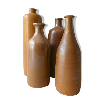 Lot of 4 bottles of glazed sandstone