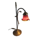 Brass articulated lamp with glass paste signed art of France.