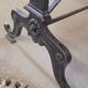 Large bistro table with a wooden top and cast iron legs - 2m56